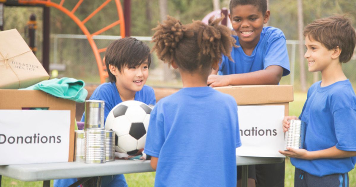 Children at youth sports team fundraiser selling beef sticks. 